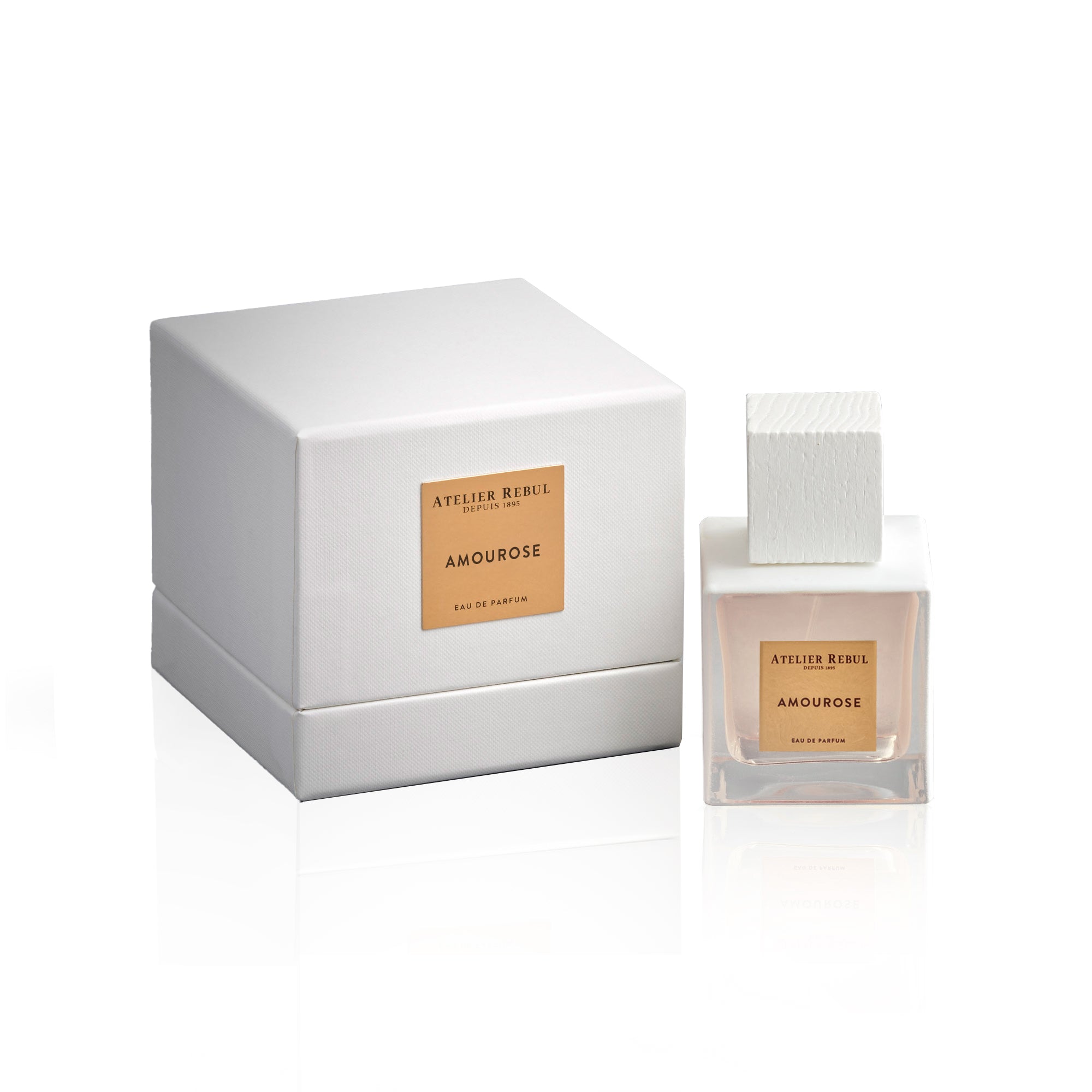 amourose parfumflasche 100 ml in weissgold neben produktverpackung. weisser hintergrund.