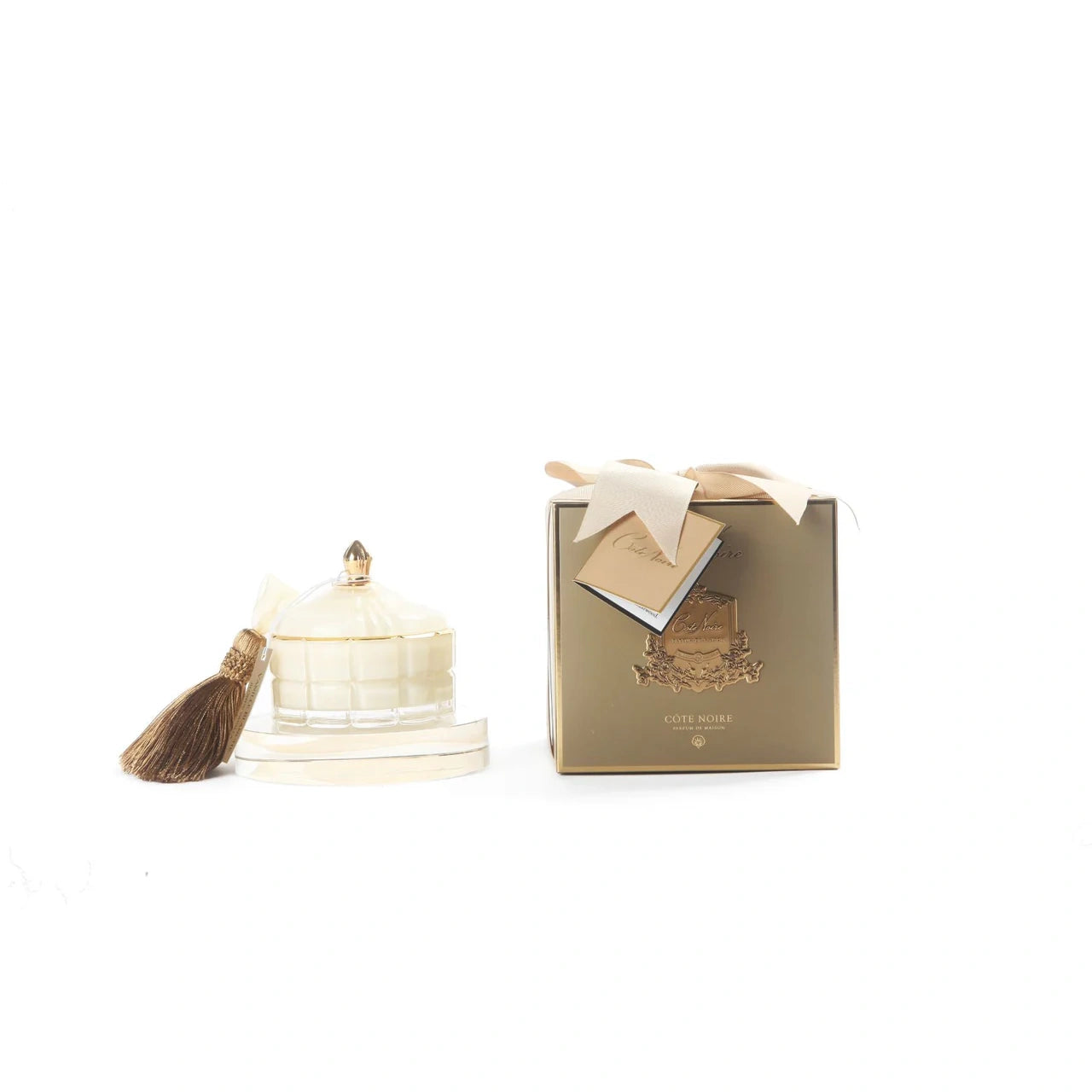 Côte Noire Duftkerze Blonde Vanilla mit Geschenkbox und goldener Verzierung, dekoriert mit Quaste