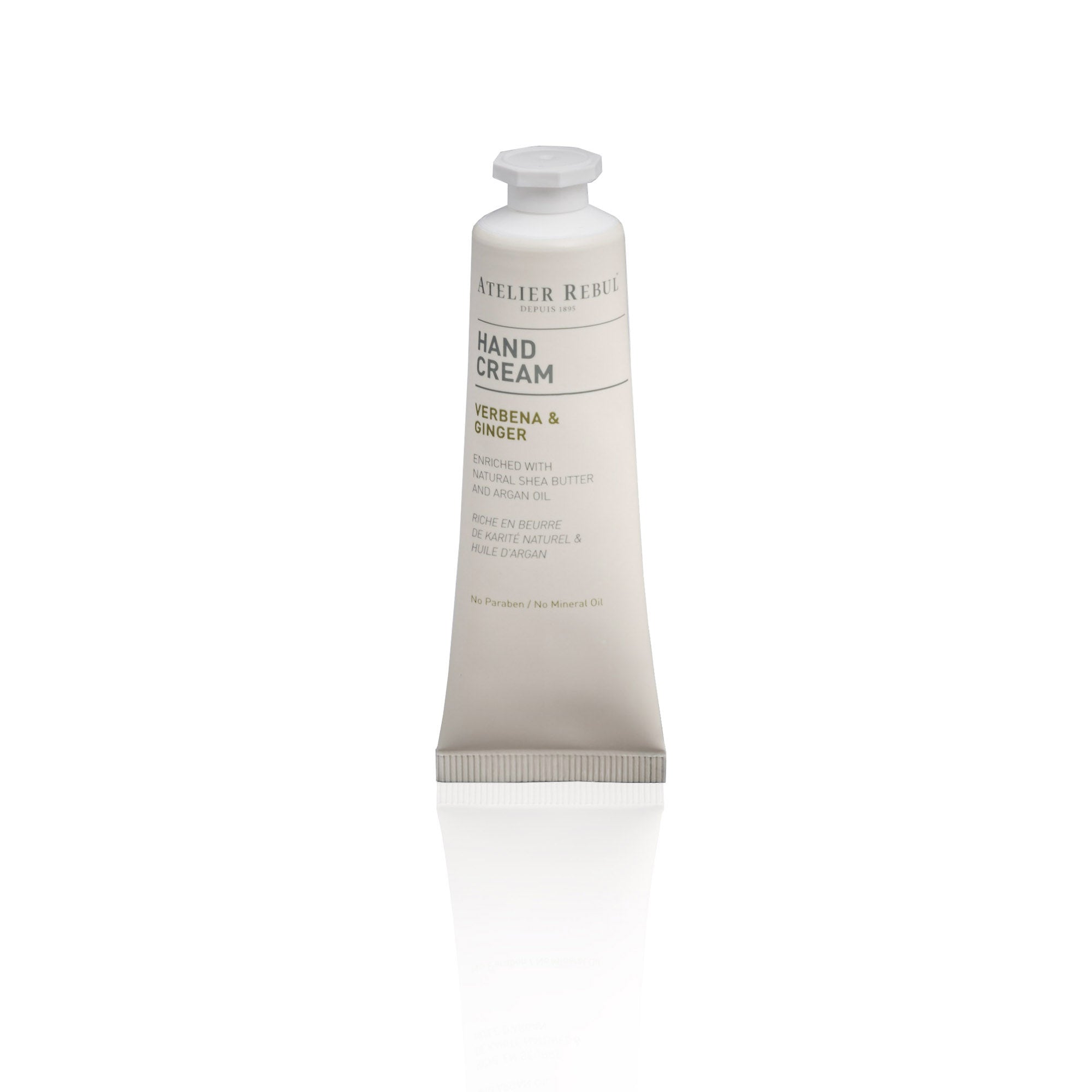kleine beigefarbene druecktube mit deckel handcreme verbena ginger vor weissem hintergrund