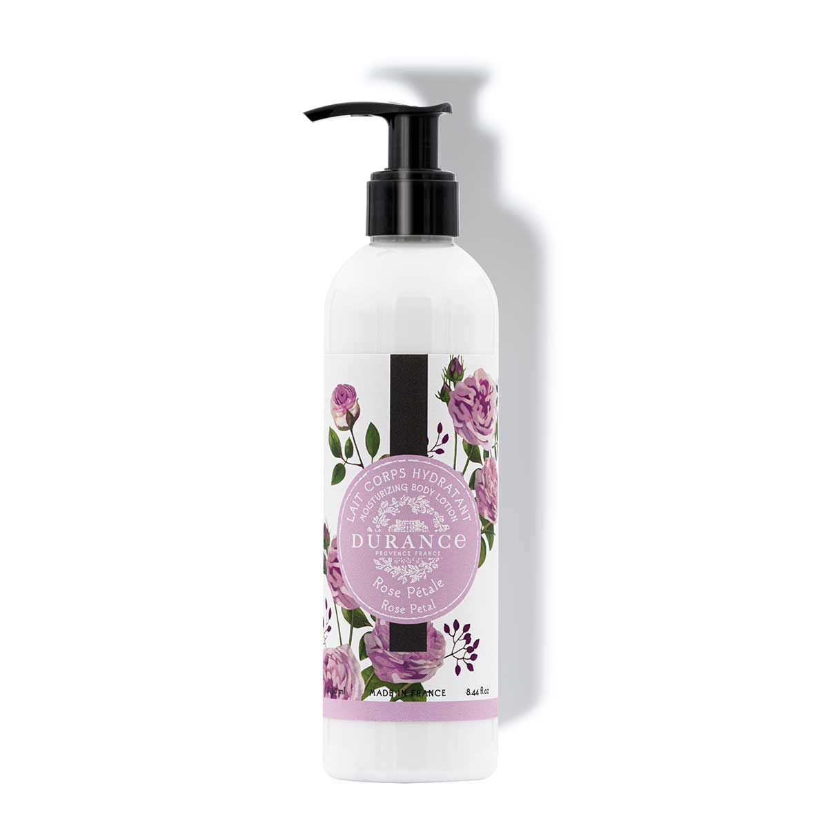 250ml koerperlotion rosenblüten in einer kunststoffflasche mit pumpfunktion vor einer weissen wand