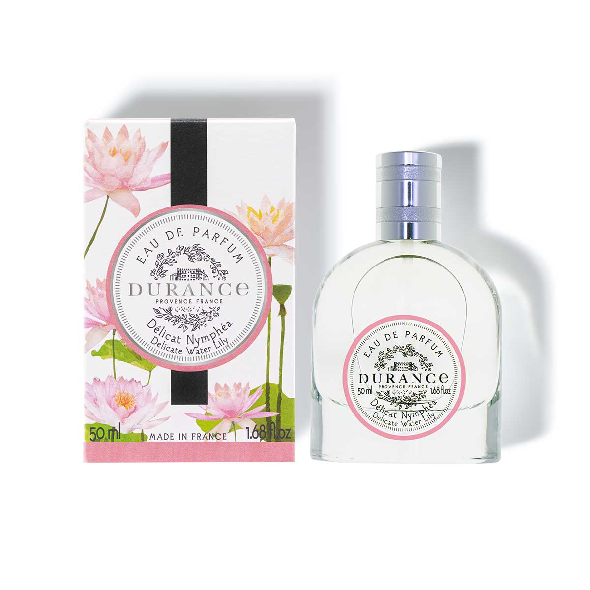 Hintergrund weiss edp halbrunde glasflache "zarte Seerose " zum spruehen mit der Verpackung