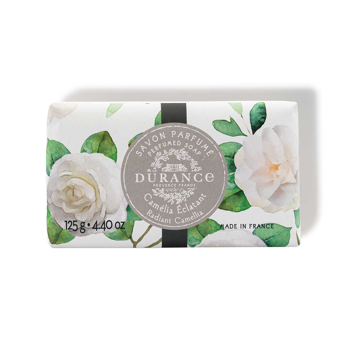 exclusives blumenpapier eingepackte seife duft berauschende kamelie  hintergrund weiss