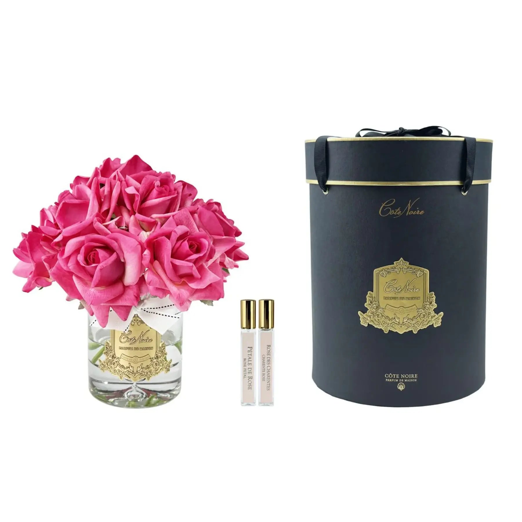 Luxuriöser Duftrosenstrauß in tiefem Magenta mit goldener Verzierung und edler Geschenkbox.