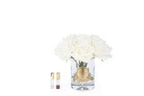 luxury grand bouquet mit 13 cremeweissen rosen vor weissem hintergrund. daneben zwei zugehoerige duftsprays.